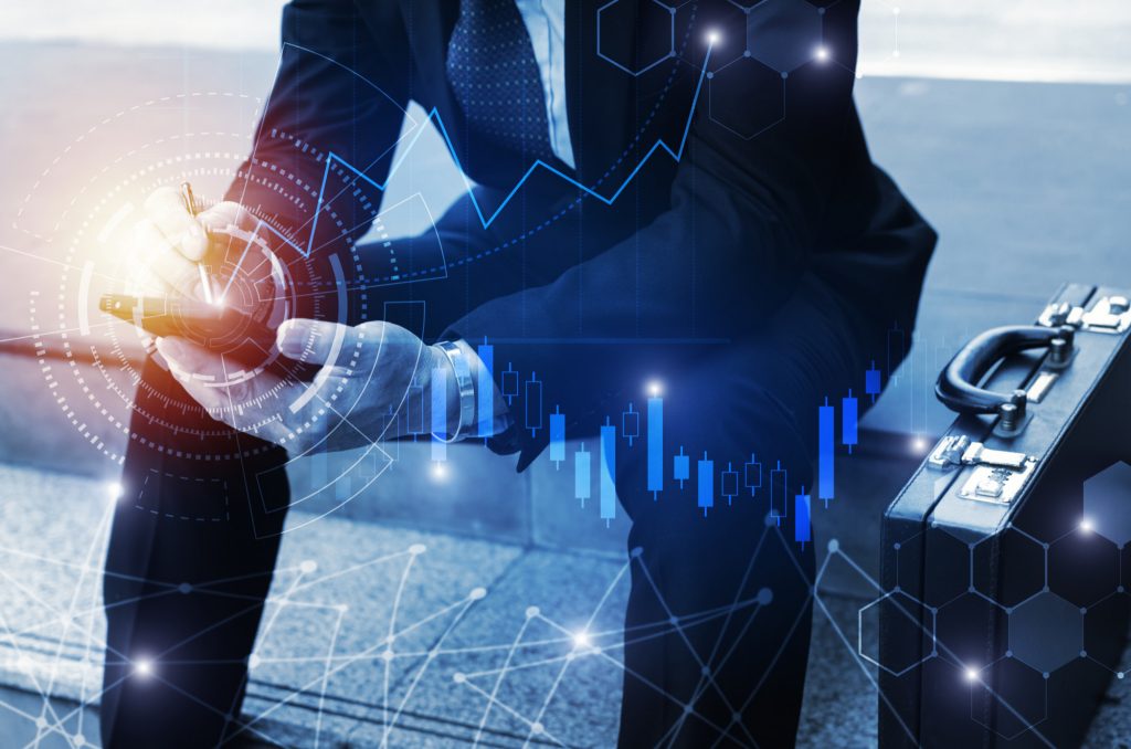 young-investor-business-man-using-mobile-phone-with-graphic-global-network-connection-1-1024x678.jpg