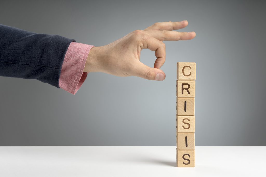wooden-blocks-with-crisis-mesage-desk-1024x683-1.jpg